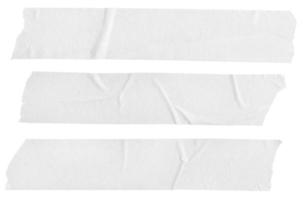 Three white Blank painter tape stickers isolated on white background photo