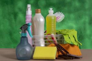 basket with cleaning products for home hygiene use photo