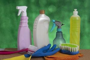 basket with cleaning products for home hygiene use photo