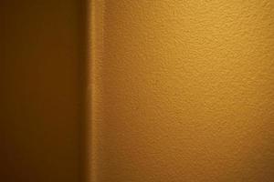 Surface texture of gold metal surface with bending section and copy space for abstract background and 3d pattern. photo