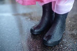 Close up of galoshes on a rainy day photo