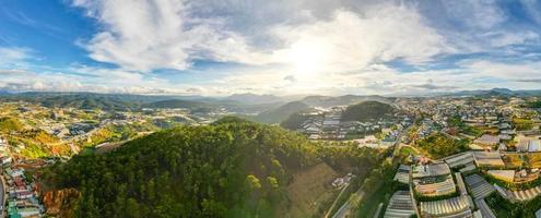 360 Panorama of Breathtaking Mountain Skyline in Da Lat City, Vietnam A Stunning View of Cityscape and Majestic Mountains under the Blue Sky photo