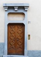 Old door in medieval district, Bergamo, Italy concept photo. Urban architectural photography. photo