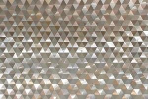 Abstract retro pattern of geometric shapes. Gold gradient mosaic backdrop. Geometric hipster triangular background. photo