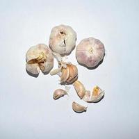 Garlic bulbs and cloves on a white background. close-up. photo