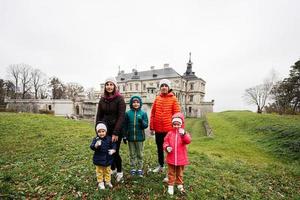 Mother with four kids visit Pidhirtsi Castle, Lviv region, Ukraine. Family tourist. photo