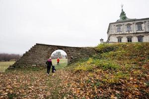 Mother with four kids visit Pidhirtsi Castle, Lviv region, Ukraine. Family tourist. photo