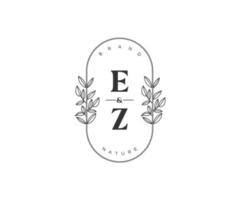 initial EZ letters Beautiful floral feminine editable premade monoline logo suitable for spa salon skin hair beauty boutique and cosmetic company. vector