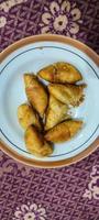 Pisang molen, Indonesian traditional food made from banana wrap with a sheet of pastry dough photo
