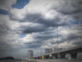 Defocused blurred photo of vehicles and scenery on the Muhammad Bin Zayed toll road