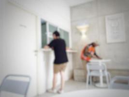 Defocused blurred photos of people who are FORE coffee buyers are lining up to order the coffee they want.