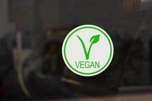 vegano firmar en un Tienda ventana foto