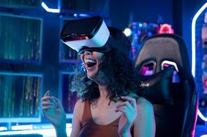 A young Asian woman using virtual reality  , vr box to play online game or watch movie