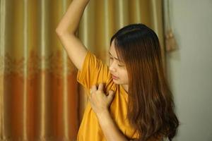 Asian woman on the bed itchy skin photo