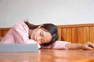 business woman sleepy from overwork photo