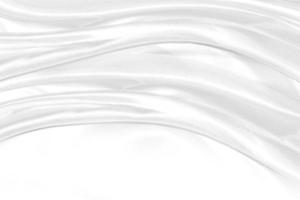 White gray satin texture that is white silver fabric silk background with beautiful soft blur pattern natural. photo