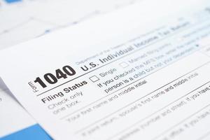 Tax form 1040 U.S. Individual Income Tax Return, business finance concept. photo