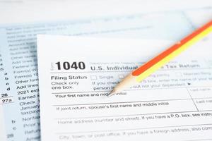 Tax form 1040 U.S. Individual Income Tax Return, business finance concept. photo