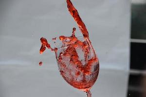 red wine water fill in wine glass photo