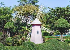 windmill wind turbine in the garden park photo