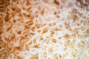 noodles background on hot pot, boiled instant noodles for instant noodle cooked food photo