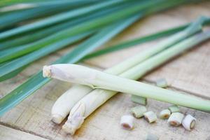 lemon grass on wooden background and leaf photo