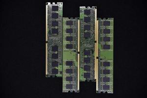 Blue RAM bars on a black background. Computer memory chips. Computer chips. photo