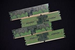 Blue RAM bars on a black background. Computer memory chips. Computer chips. photo