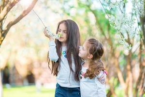 Little girls in the park photo