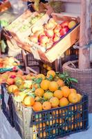Fruits in plastic crates for sale photo