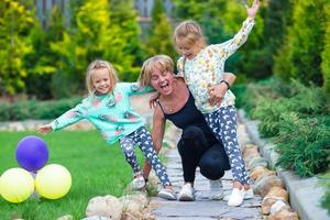 Grandmother and little girls photo