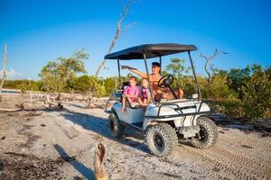 Family on the beach car photo