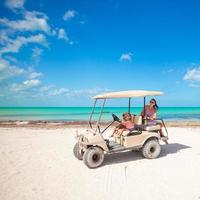 Family on the beach car photo