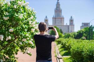 man taking photo on the park