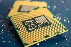 CPU, central processor unit chip Chip on circuit board in PC and laptop computer technology. photo