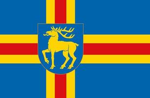 Flag of the Aland Islands. The administrative center of Mariehamn. photo