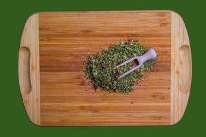 Background of natural green tea with mint, lemon balm, hibiscus and berries. Texture of green tea. Top view, flat lay. photo