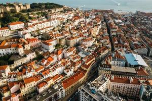 Aerial drone view of St. George Castle in Lisbon, Portugal with surrounding cityscape photo