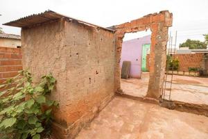 Planaltina, Goias, Brazil, February 18 2023 A poorly constructed home in Brazil, that is on the verge of collapsing photo