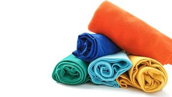 assorted colors of cotton fabric rolls for t-shirts photo