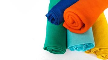 assorted colors of cotton fabric rolls for t-shirts photo