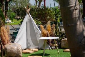 White camp and dry trees photo