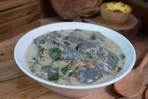 selective focus on food kapurung is a soup with a slightly sour and fresh taste originating from Sulawesi, this food is made from sago flour or starch with fish water broth, soft focus photo