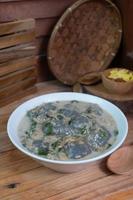selective focus on food kapurung is a soup with a slightly sour and fresh taste originating from Sulawesi, this food is made from sago flour or starch with fish water broth, soft focus photo