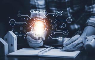 Man using Laptop and touch bar Chat bot Chat with AI, Artificial Intelligence, System Artificial intelligence an artificial intelligence chatbot, Digital chatbot, Robot application, conversation photo