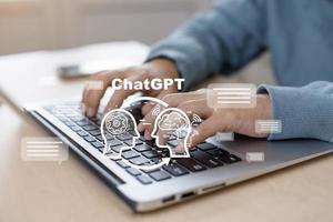 Man using Laptop and touch bar Chat bot Chat with AI, Artificial Intelligence, System Artificial intelligence an artificial intelligence chatbot, Digital chatbot, Robot application, conversation photo