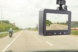 Car CCTV camera video recorder for driving safety on the road photo