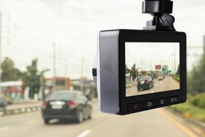 Car CCTV camera video recorder for driving safety on the road photo