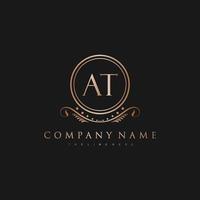 AT Letter Initial with Royal Luxury Logo Template vector