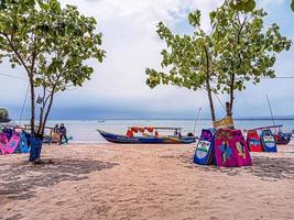 Morning view on the beach with bright clouds. photo